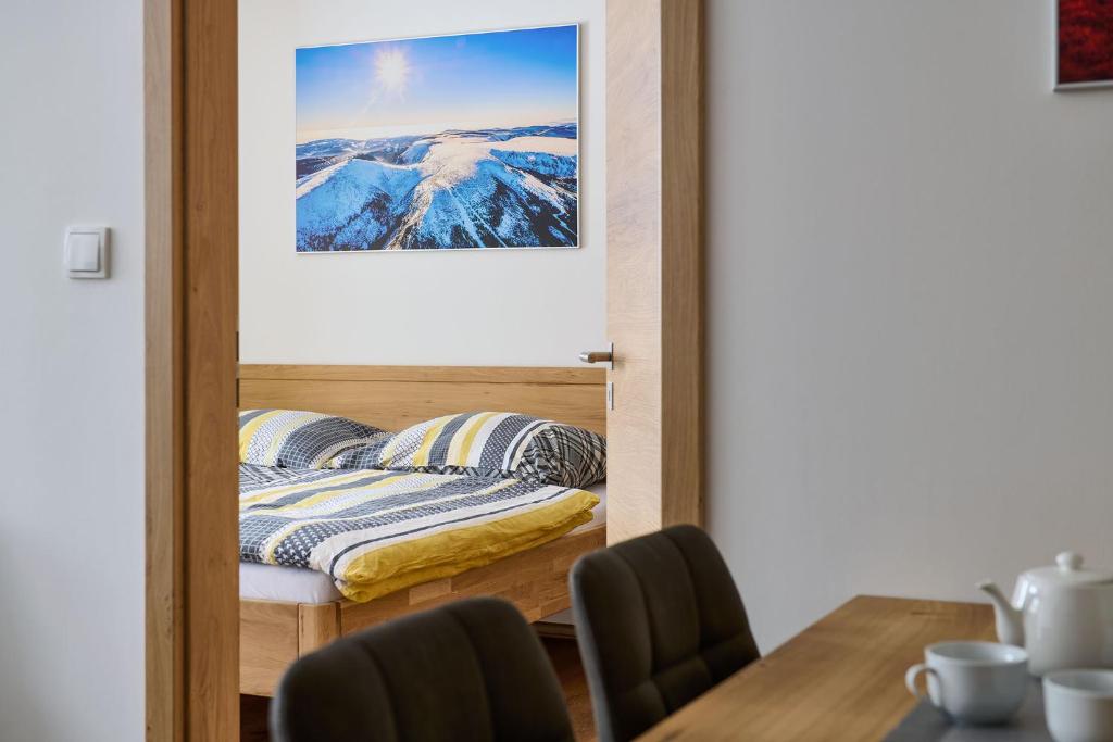 Postel nebo postele na pokoji v ubytování Luční apartmán Jurajda