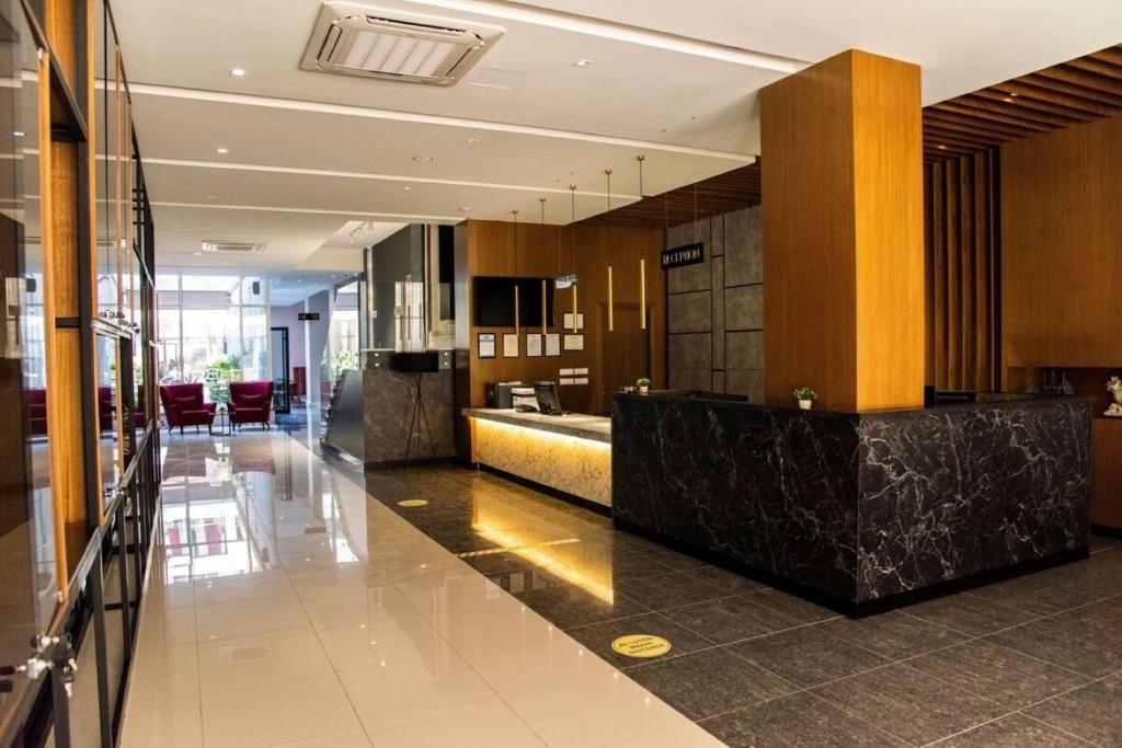 Kuchyň nebo kuchyňský kout v ubytování Ajsel Hotel