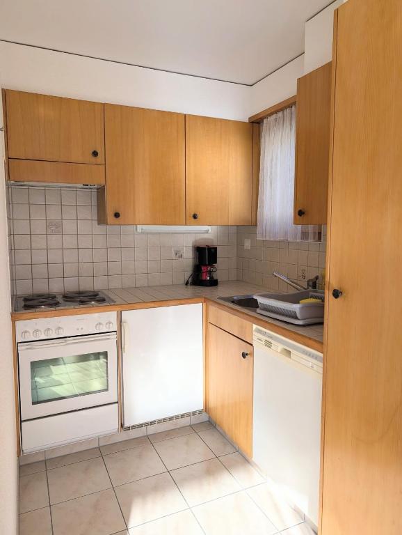 Kuchyň nebo kuchyňský kout v ubytování Appartement Thermal Ovronnaz 3 Pieces