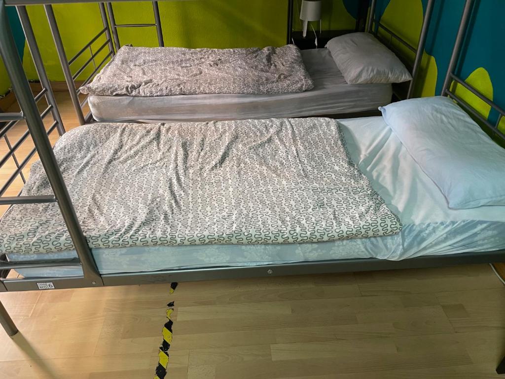A bed or beds in a room at Bed Madrid Rooms by Bossh! Hotels