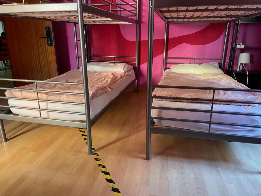 A bed or beds in a room at Bed Madrid Rooms by Bossh! Hotels