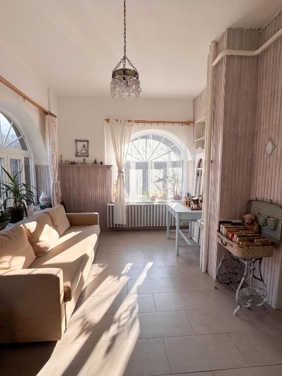 A seating area at Halháza Erdészlak Apartman