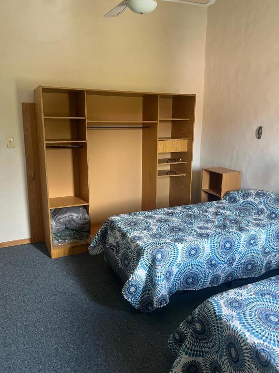 Voodi või voodid majutusasutuse Duplex 4pax Playa Unión toas