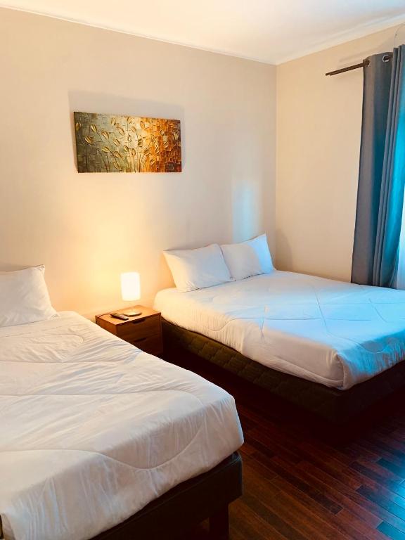 Postel nebo postele na pokoji v ubytování Península Hostel