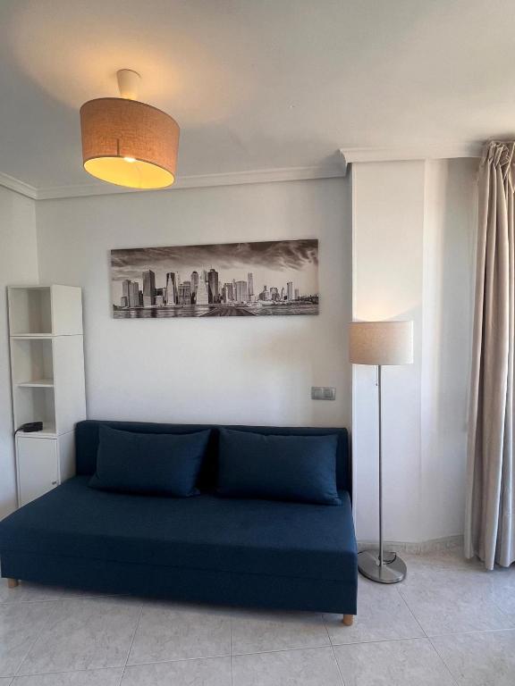 A seating area at Apartamento Exclusivo en la Playa 9