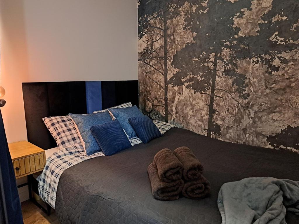 Ένα ή περισσότερα κρεβάτια σε δωμάτιο στο Chillout Apartment GIS17 - free parking