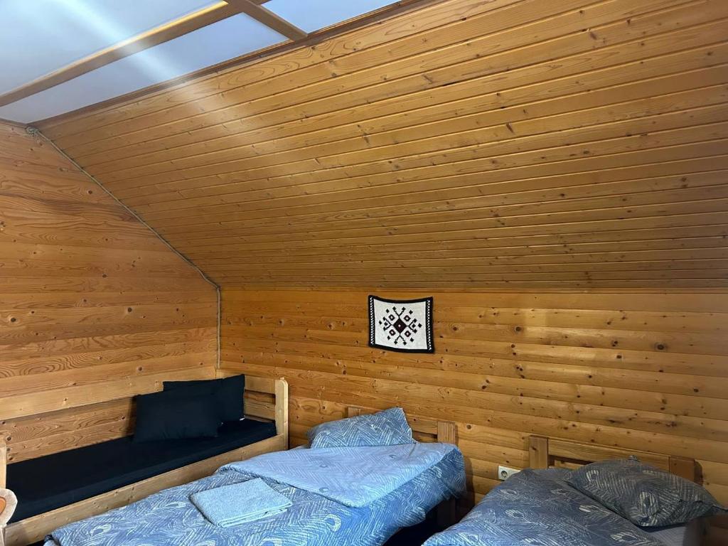 Postel nebo postele na pokoji v ubytování Готель Могул