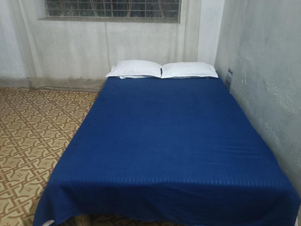Postel nebo postele na pokoji v ubytování Hotel Kalzug