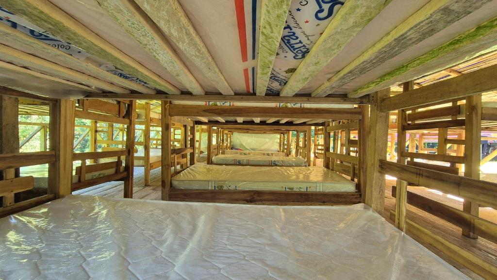 Postel nebo postele na pokoji v ubytování Eco Farmstay Finca Las Aguas