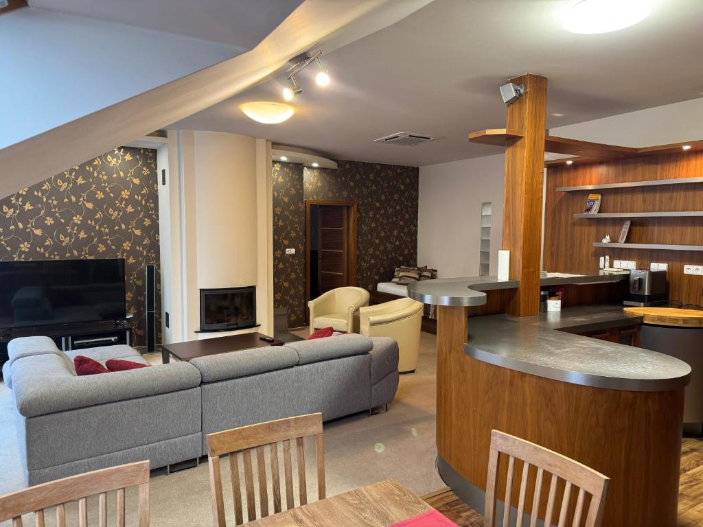 Posezení v ubytování Apartmán Bílá Hora - Roudná