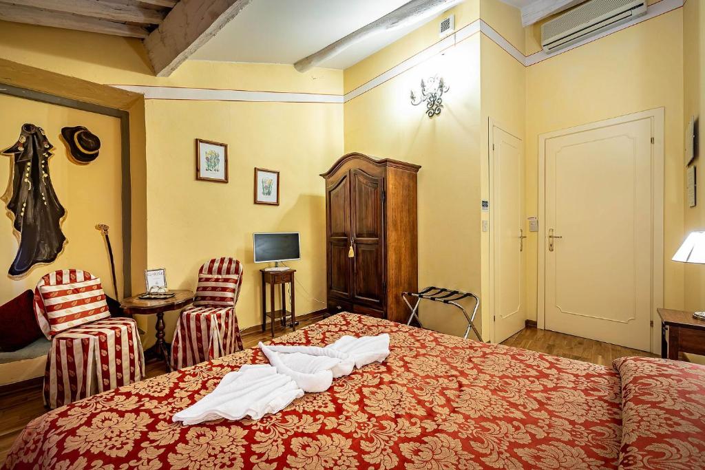 Postel nebo postele na pokoji v ubytování Antica Dimora Patrizia