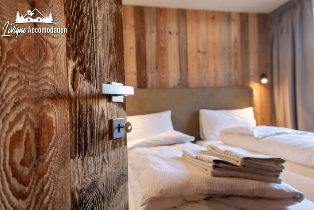 Posteľ alebo postele v izbe v ubytovaní Chalet 1816 by Livigno Accomodation