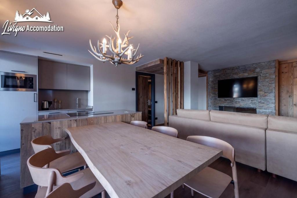 Televízia a/alebo spoločenská miestnosť v ubytovaní Chalet 1816 by Livigno Accomodation