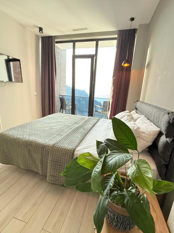 Postel nebo postele na pokoji v ubytování Villa Deluxe Kvariati
