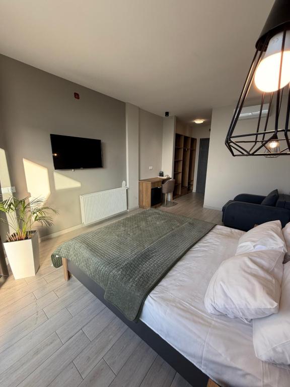 Postel nebo postele na pokoji v ubytování Villa Deluxe Kvariati
