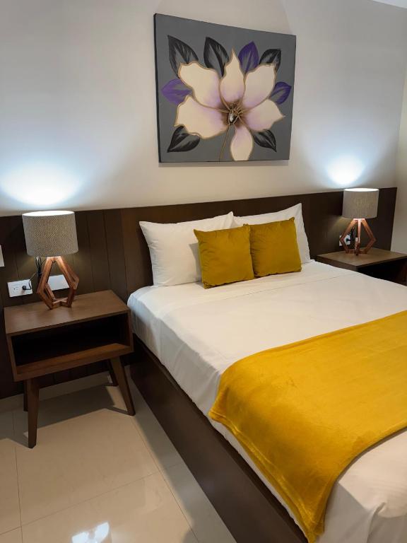 Uma cama ou camas num quarto em Hotel Faava