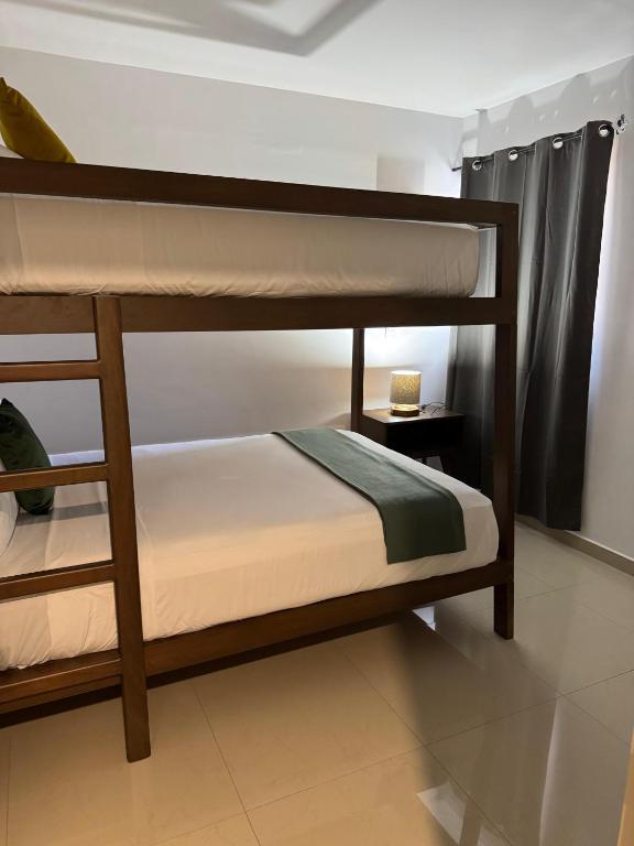 Uma cama ou camas num quarto em Hotel Faava