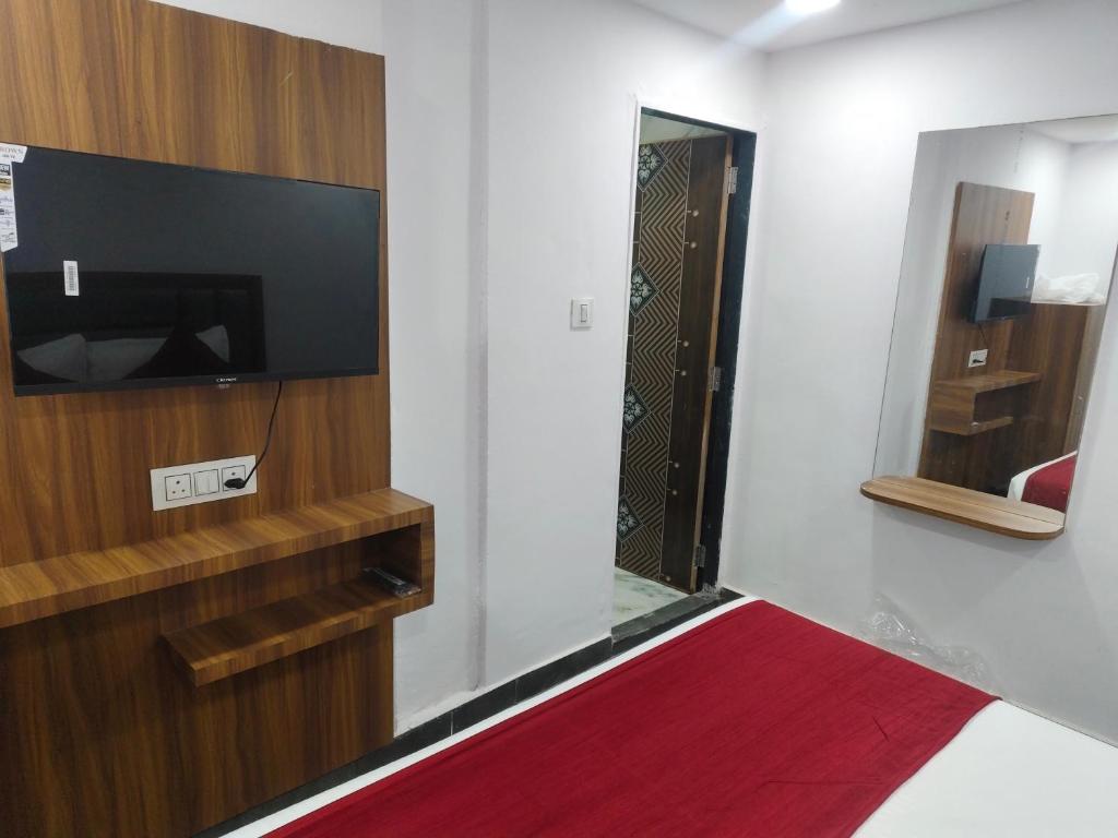 TV a/nebo společenská místnost v ubytování Hotel Maruti R
