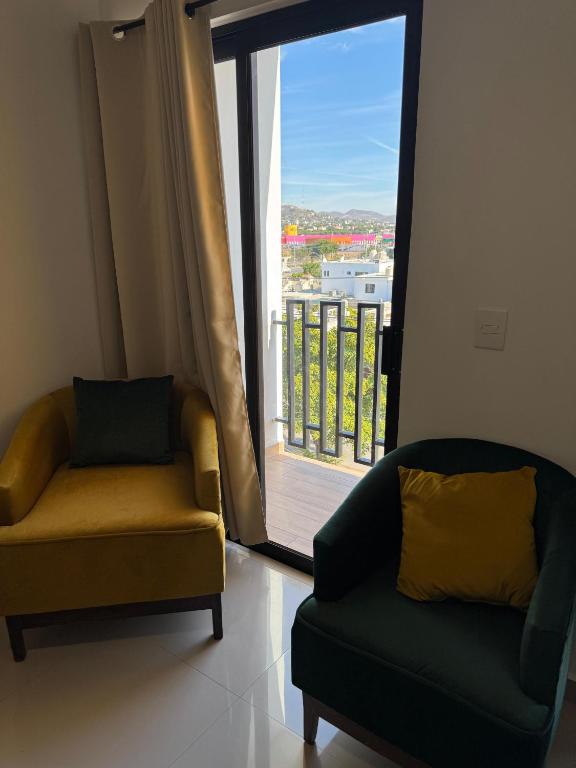 Uma área de estar em Hotel Faava