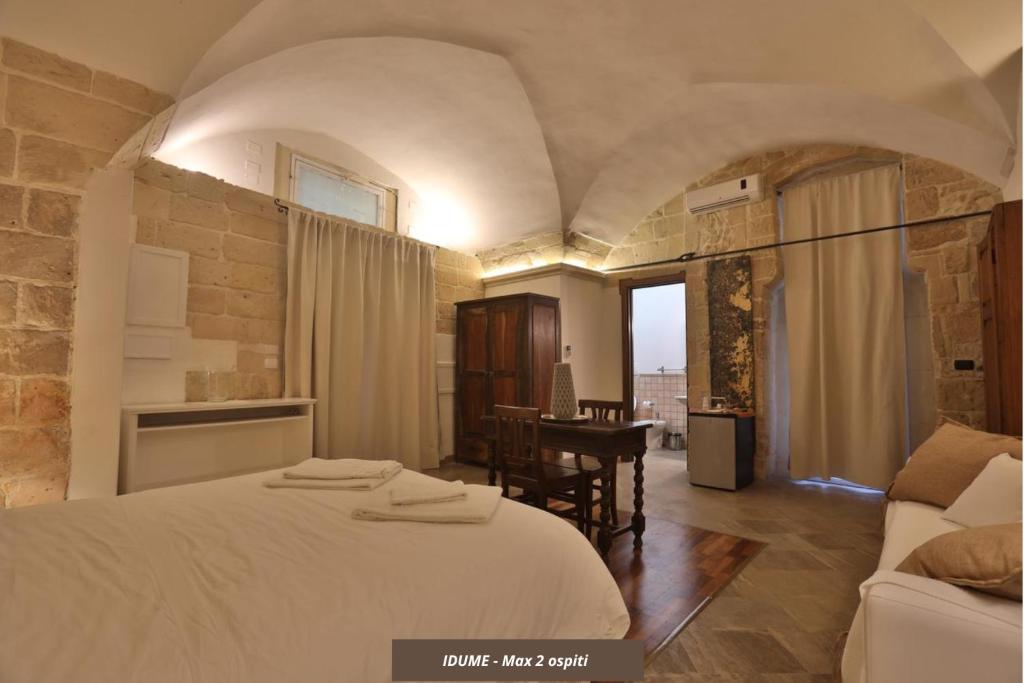 Postel nebo postele na pokoji v ubytování Chiesa Greca Suites - Lecce Selection