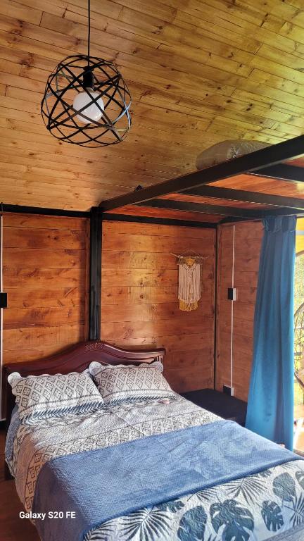 Postel nebo postele na pokoji v ubytování Hospedaje Rural Sicaru