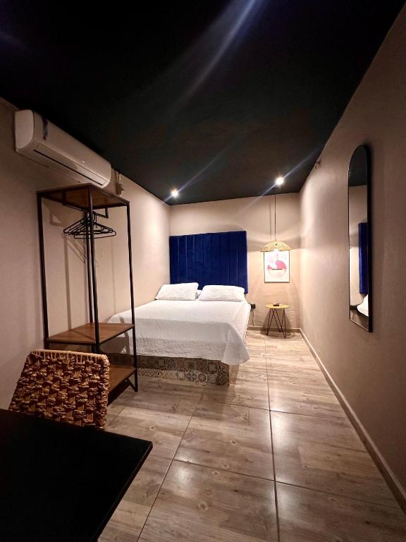 Postel nebo postele na pokoji v ubytování Hotel Londres