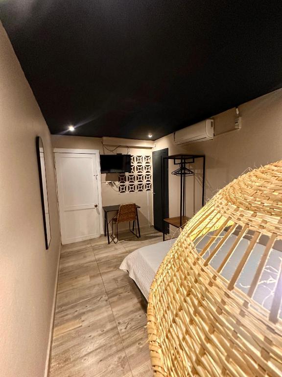 Postel nebo postele na pokoji v ubytování Hotel Londres