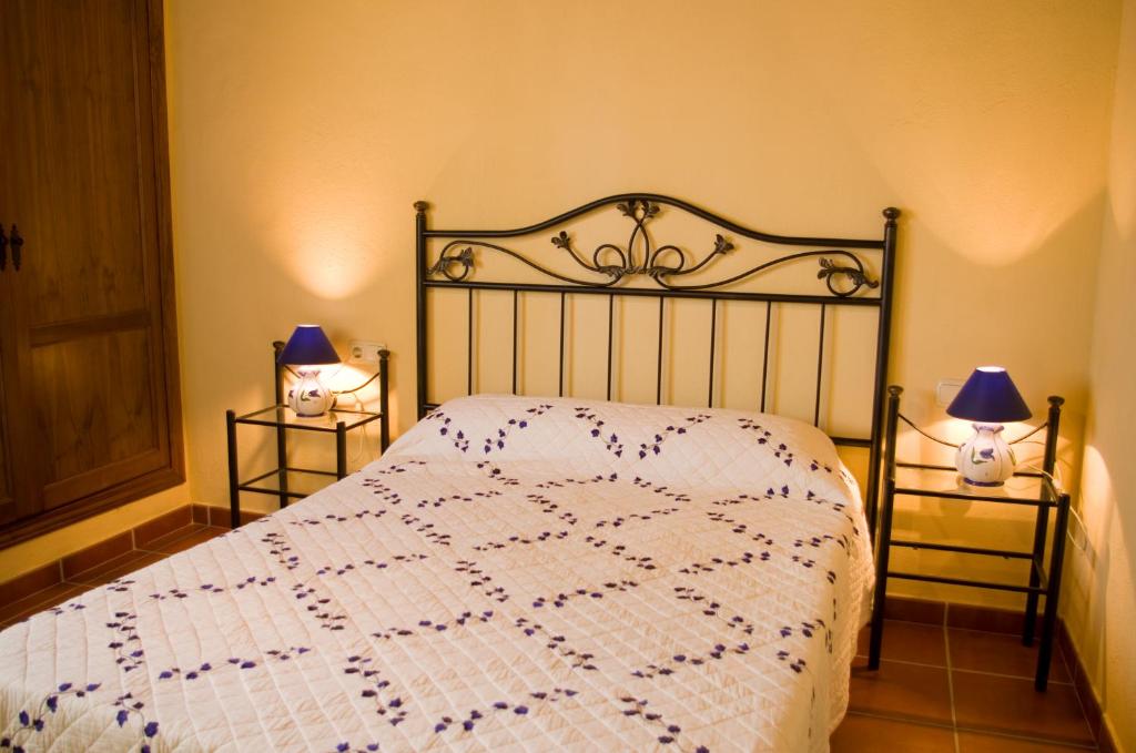 Postel nebo postele na pokoji v ubytování Rural Montes Málaga: Lagar Don Sancho