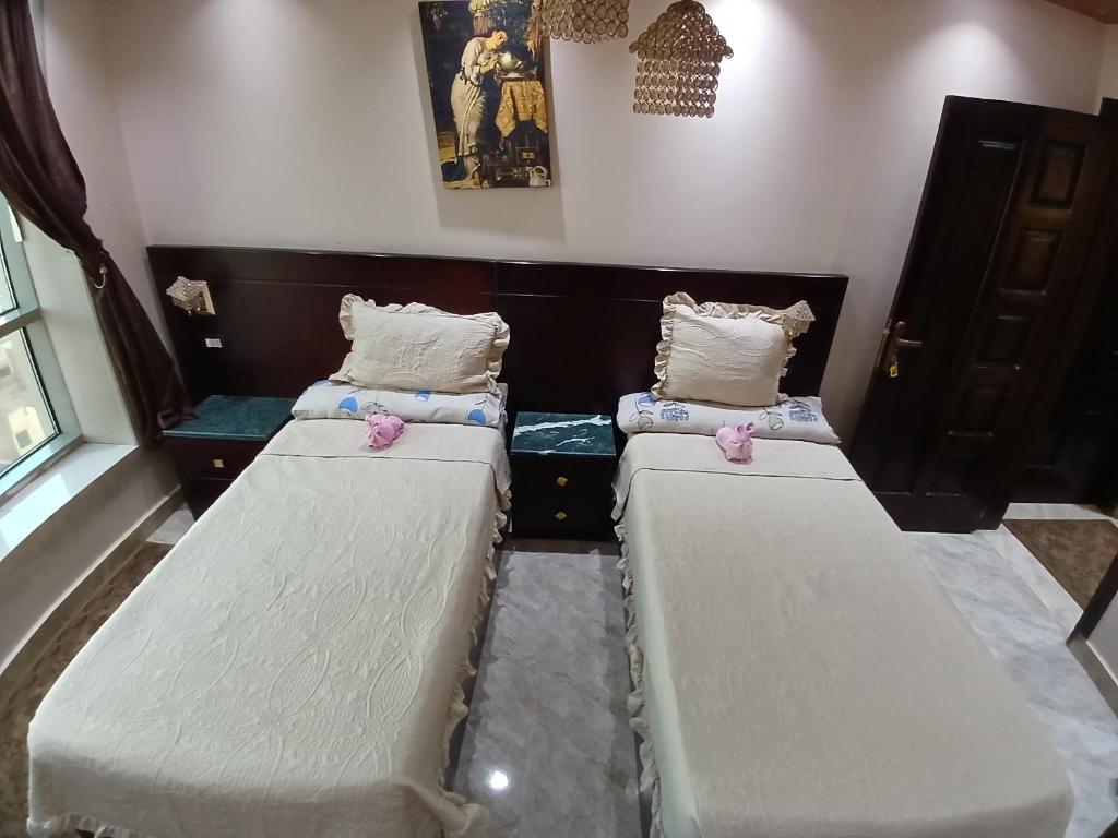 Postel nebo postele na pokoji v ubytování Monty Homestay