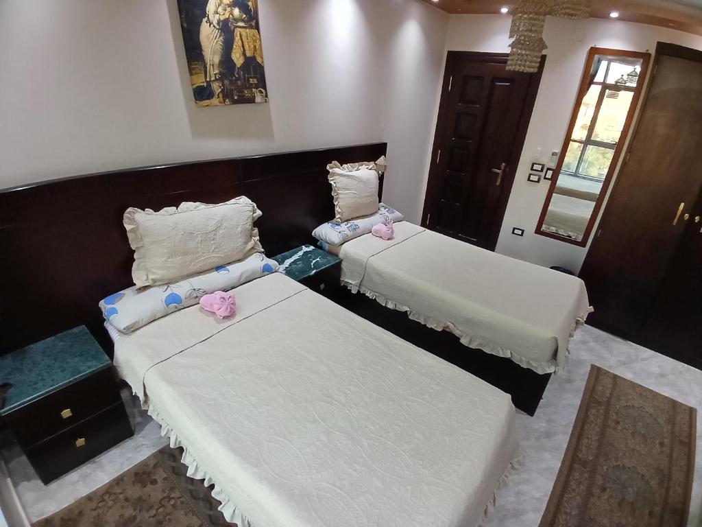 Postel nebo postele na pokoji v ubytování Monty Homestay