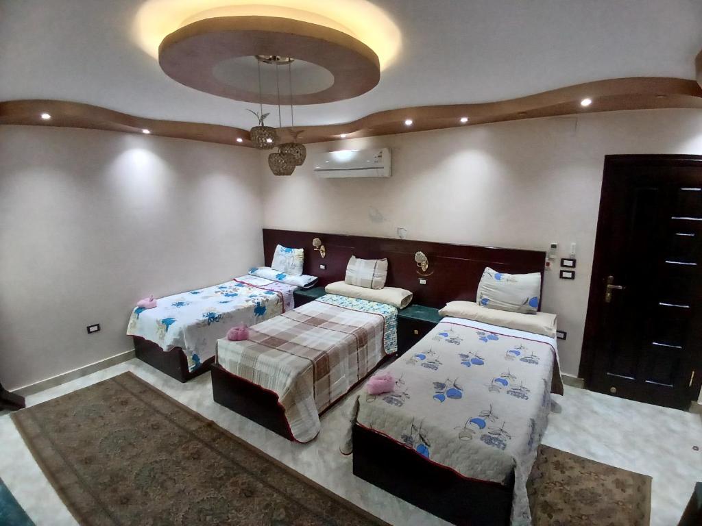Postel nebo postele na pokoji v ubytování Monty Homestay