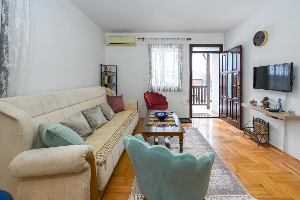 TV a/nebo společenská místnost v ubytování Tim Apartment