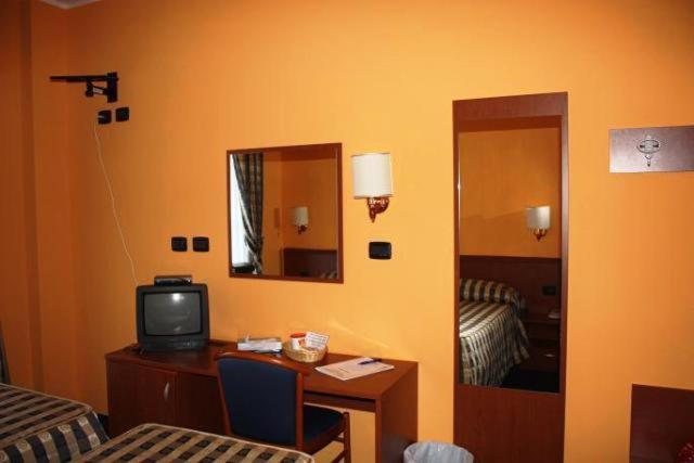 TV a/nebo společenská místnost v ubytování Hotel Tre Denti