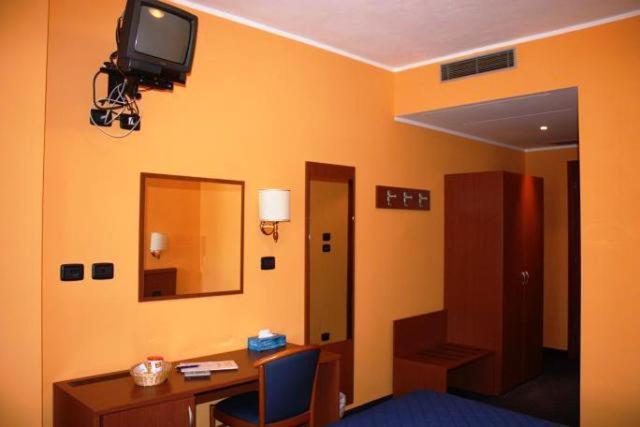 TV a/nebo společenská místnost v ubytování Hotel Tre Denti
