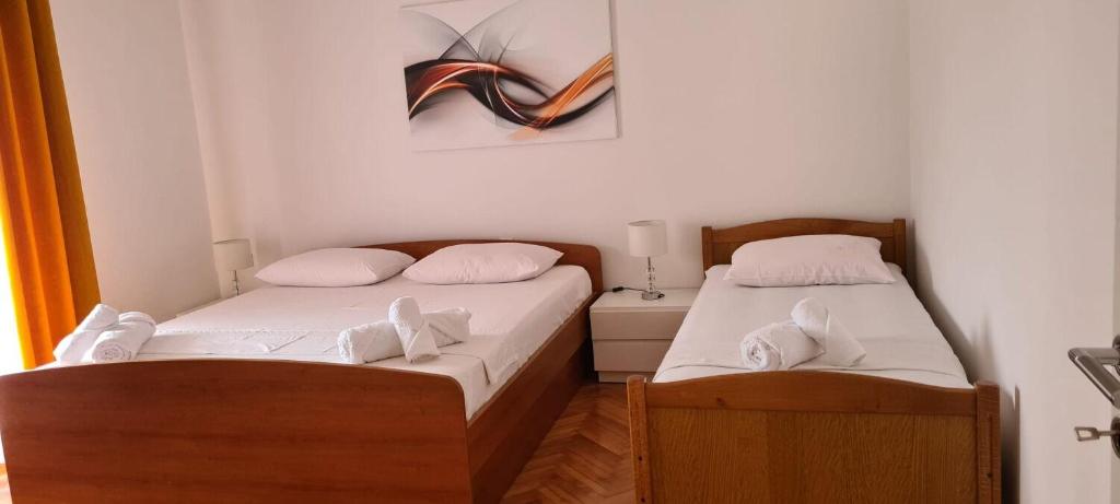 Posteľ alebo postele v izbe v ubytovaní Apartments DaRi