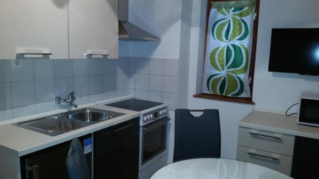 Kuchyňa alebo kuchynka v ubytovaní Apartments DaRi