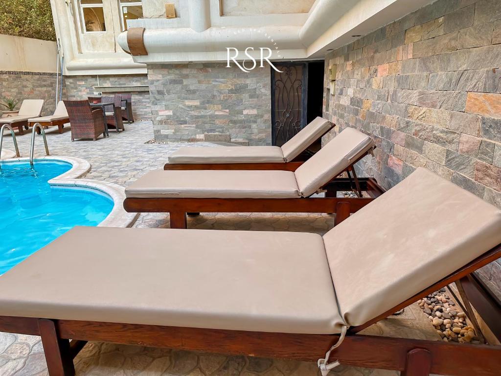 Bazén v ubytování Elite Suites Hurghada nebo v jeho okolí