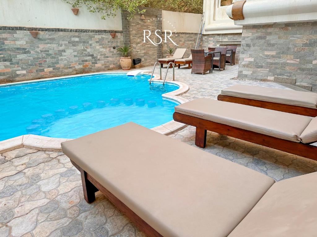 Bazén v ubytování Elite Suites Hurghada nebo v jeho okolí