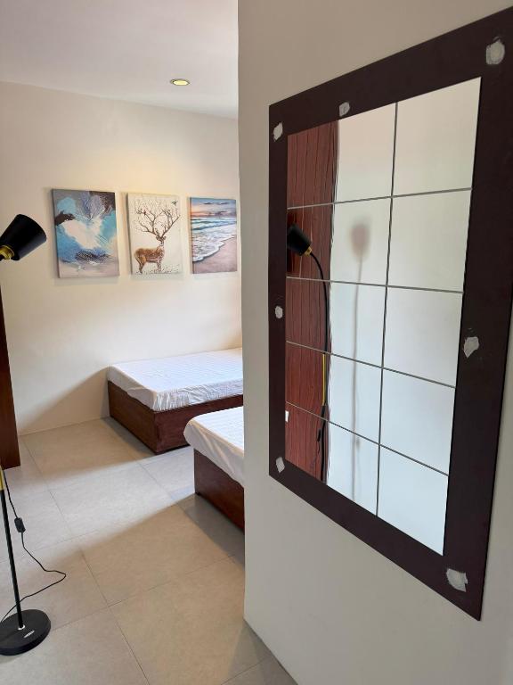 Postel nebo postele na pokoji v ubytování Lakandiwa Tourist Inn