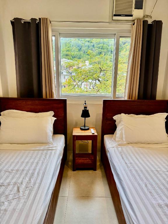 Postel nebo postele na pokoji v ubytování Lakandiwa Tourist Inn