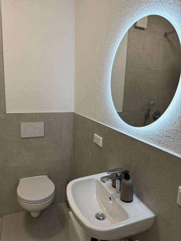 Koupelna v ubytování Bauna Suites & Apartments