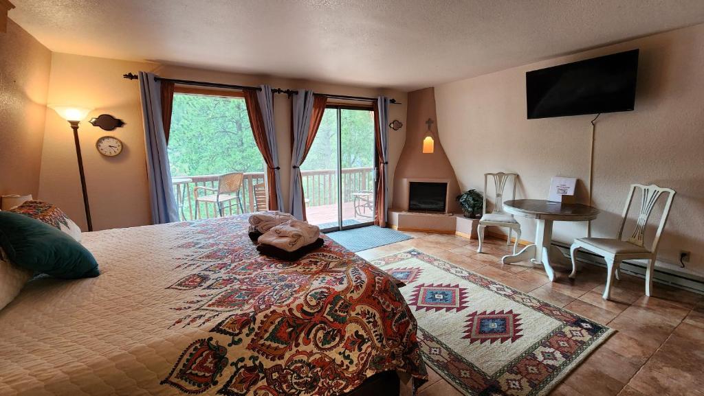 Postel nebo postele na pokoji v ubytování Kokopelli Inn