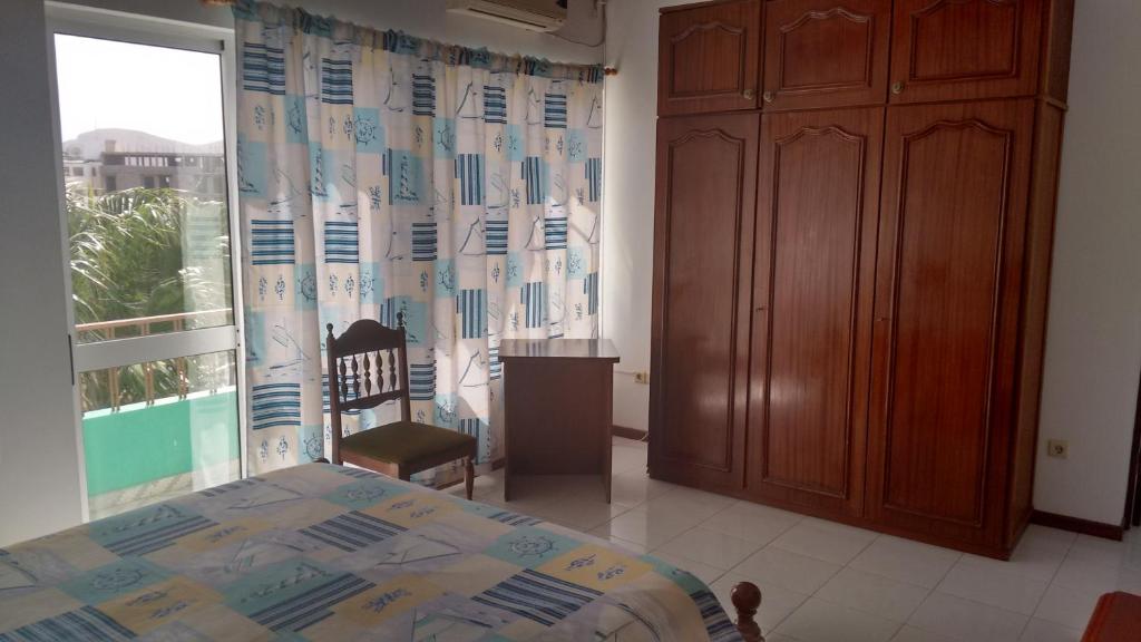 Postel nebo postele na pokoji v ubytování Arla Residential