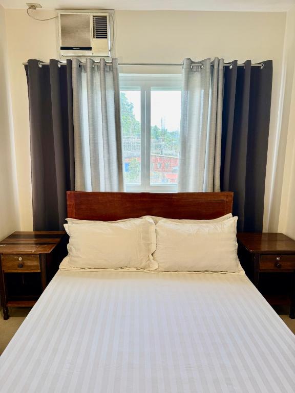 Postel nebo postele na pokoji v ubytování Lakandiwa Tourist Inn