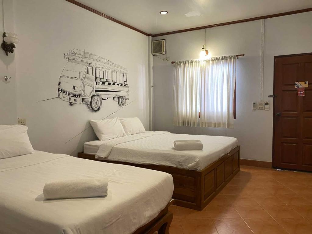 Postel nebo postele na pokoji v ubytování Old City Guest House