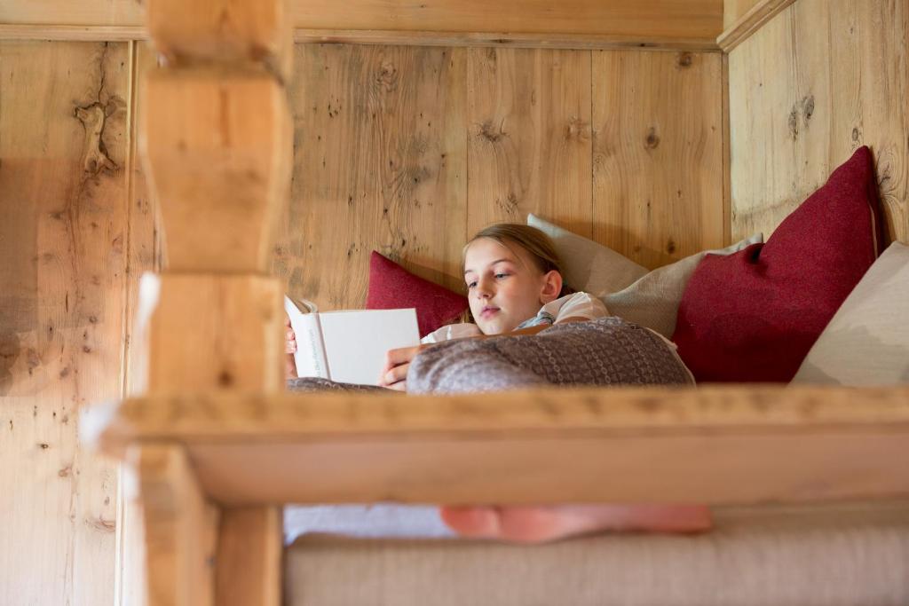 Łóżko lub łóżka w pokoju w obiekcie Chalet Hafling Leckplått