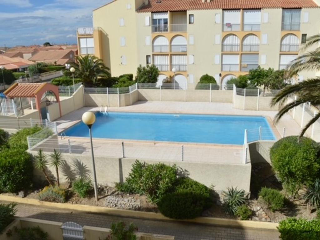 Photo de la galerie de l'établissement Appartement T2 avec Climatisation et Parking à Narbonne-Plage - FR-1-795-57, à Narbonne