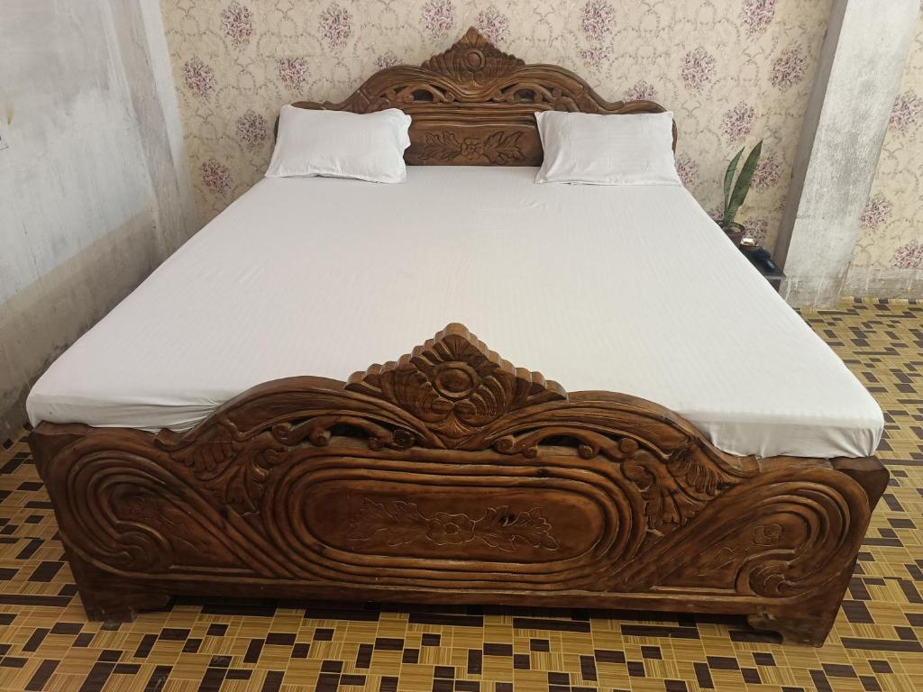 Postel nebo postele na pokoji v ubytování Hotel Kalzug