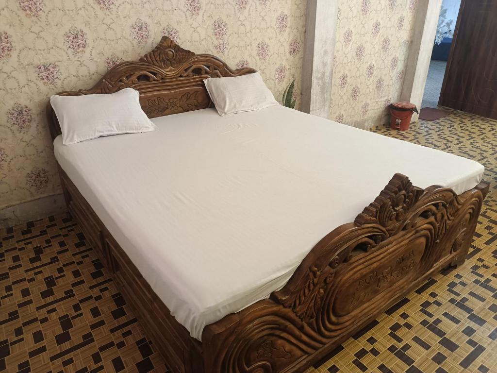 Postel nebo postele na pokoji v ubytování Hotel Kalzug