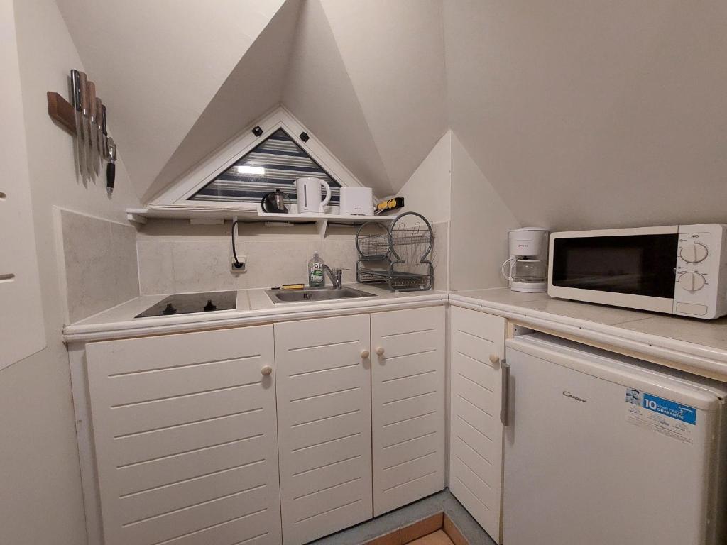 Kuchyň nebo kuchyňský kout v ubytování Exceptionnel T3 Vue Mer Village Vacances Sainte Luce